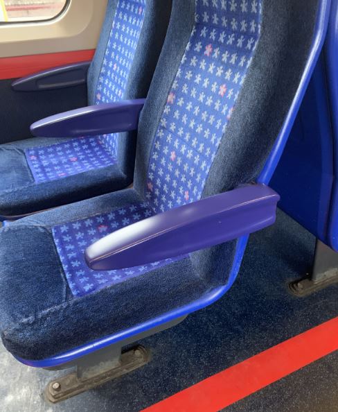 3D printed replacement part armrest on passenger train in the UK